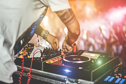 An up close stock photo of a DJ's turntables.